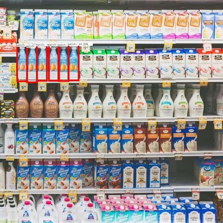 Supermarket shelves with milk products.